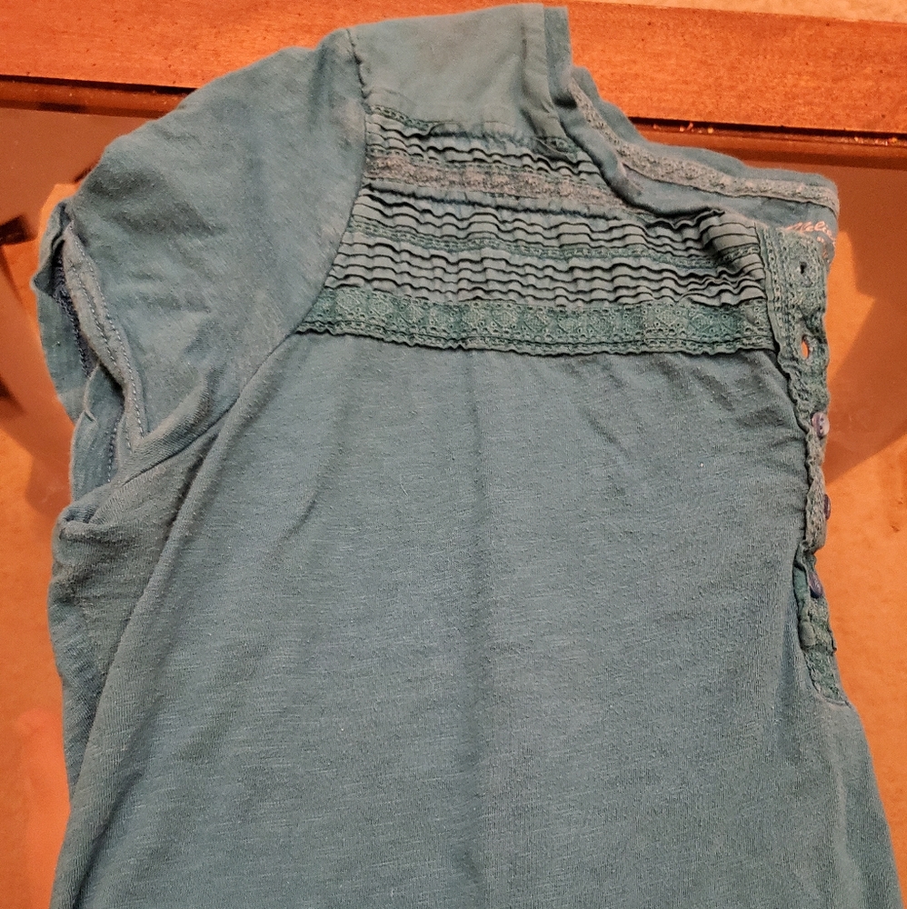Women's teal colored blouse